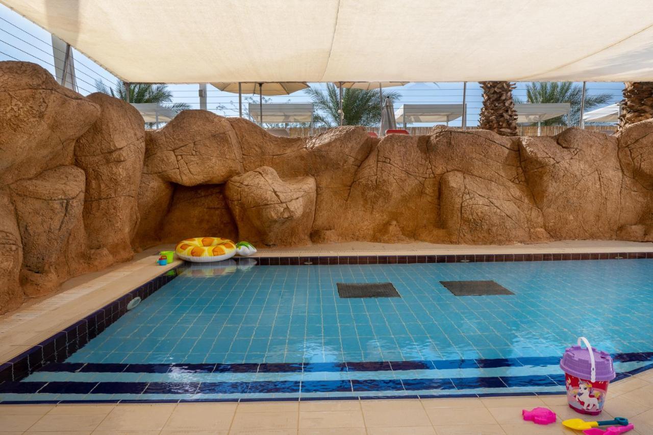 Vert Hotel Eilat By Afi Hotels Exterior photo The swimming pool at the Dead Sea Spa Magdala